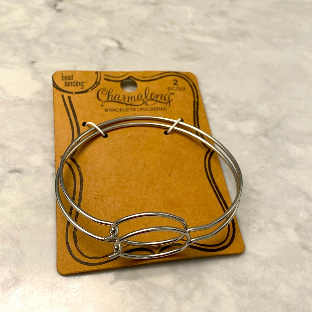 Charmalong 2 pack of silver tone bracelets - new